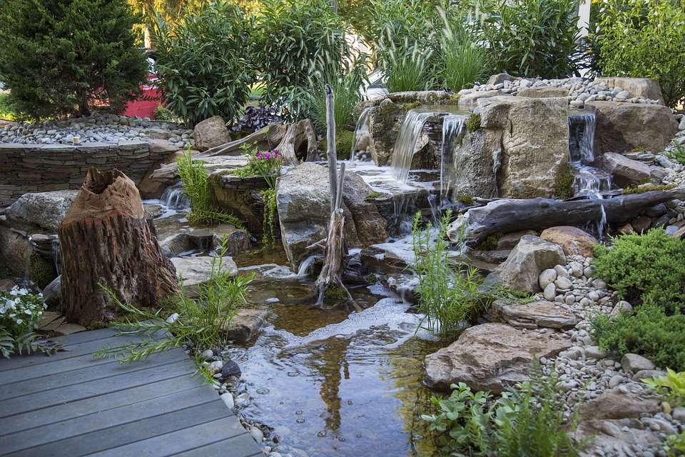 waterfall fish pond backyard living outdoor space landscaping md llc